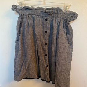 Black and grey mini skirt with buttons and pockets